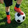 image:imageDREAM PAIRS Boys Girls Indoor Soccer Shoes High Top Football Turf Futsal Shoes for LittleBig KidOrange